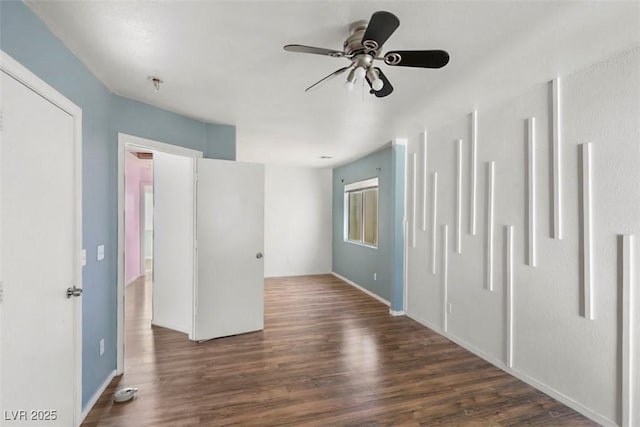 3336 Cheyenne Gardens Way N, Las Vegas, NV 89032 - empty room featuring ceiling fan, dark wood-style floors, and fire sprinkler in ceiling