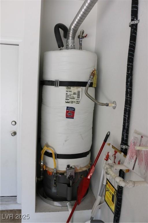 2102 Stone Well Rd, North Las Vegas, NV 89031 - utility room with water heater
