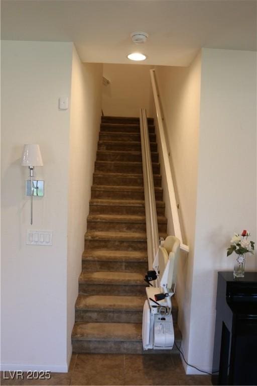 2102 Stone Well Rd, North Las Vegas, NV 89031 - stairs featuring tile patterned floors