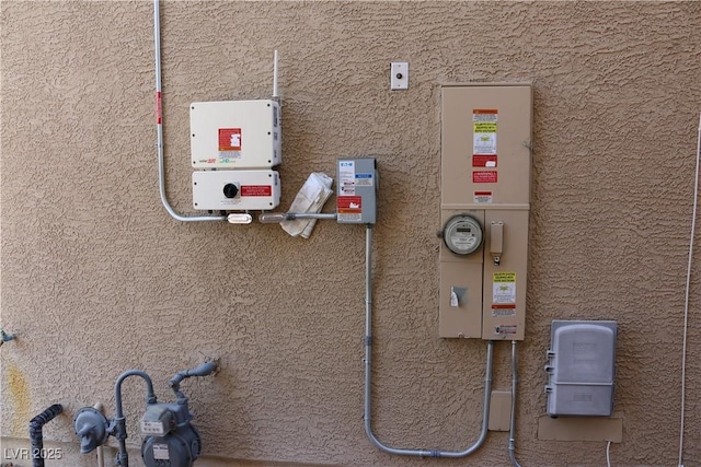 2102 Stone Well Rd, North Las Vegas, NV 89031 - exterior view of stucco siding and related energy utilities