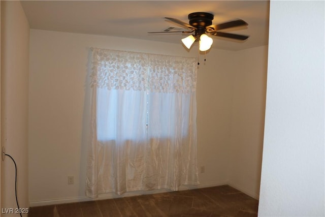 2102 Stone Well Rd, North Las Vegas, NV 89031 - unfurnished room with a ceiling fan and baseboards