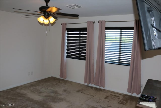 2102 Stone Well Rd, North Las Vegas, NV 89031 - carpeted spare room featuring a ceiling fan and baseboards