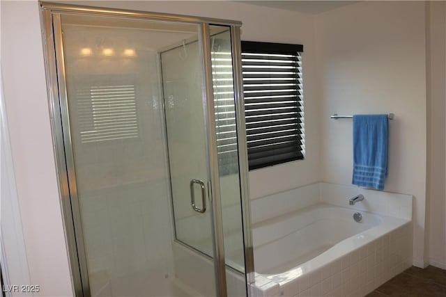 2102 Stone Well Rd, North Las Vegas, NV 89031 - bathroom with a shower stall, a garden tub, and tile patterned flooring