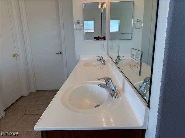 5905 Addy Ln, North Las Vegas, NV 89081 - bathroom with tile patterned flooring and double vanity