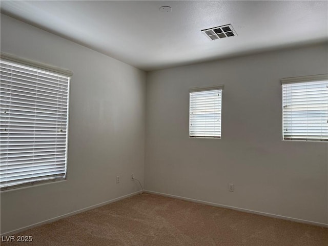 5905 Addy Ln, North Las Vegas, NV 89081 - carpeted empty room featuring baseboards
