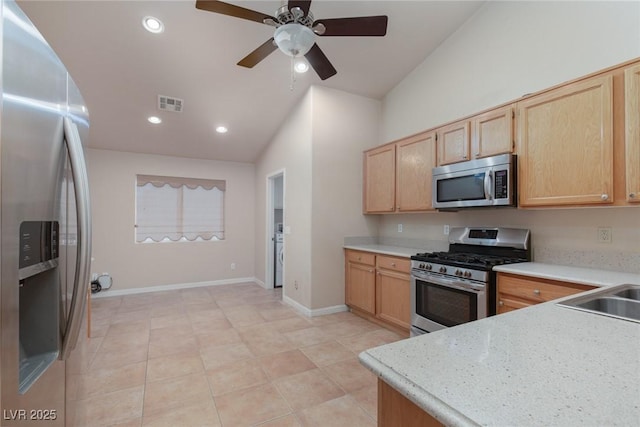 2610 Gardenia Flower Ave, North Las Vegas, NV 89031 - kitchen featuring stainless steel appliances, light brown cabinetry, a ceiling fan, light countertops, and recessed lighting