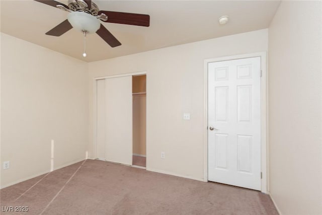 2610 Gardenia Flower Ave, North Las Vegas, NV 89031 - unfurnished bedroom featuring carpet flooring, a closet, and a ceiling fan