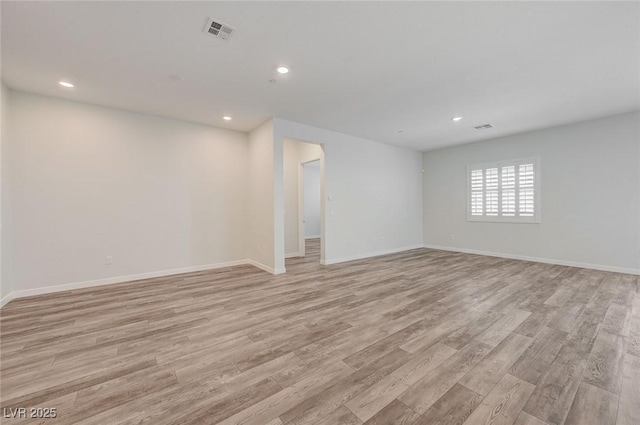 12436 Primrose Grove Ln, Las Vegas, NV 89138 - unfurnished room with light wood finished floors and recessed lighting
