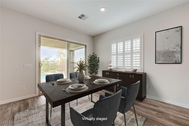 12436 Primrose Grove Ln, Las Vegas, NV 89138 - dining space with plenty of natural light, light wood-style floors, and recessed lighting