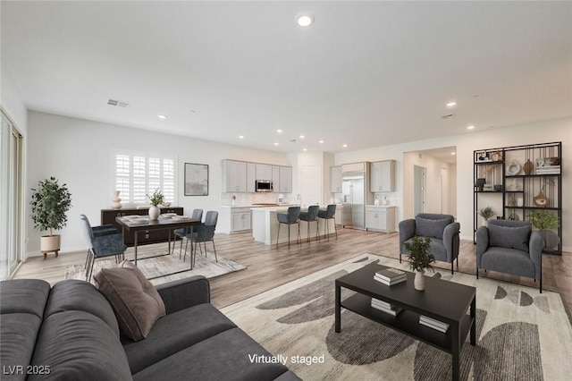 12436 Primrose Grove Ln, Las Vegas, NV 89138 - living area with light wood-style flooring and recessed lighting