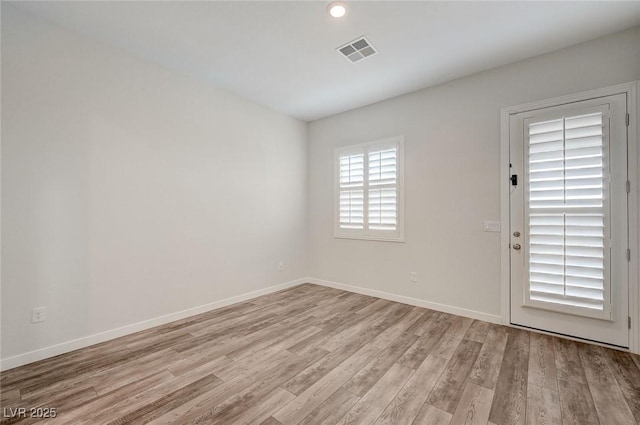 12436 Primrose Grove Ln, Las Vegas, NV 89138 - spare room featuring light wood-style flooring and recessed lighting