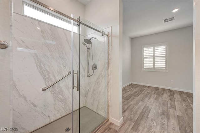 12436 Primrose Grove Ln, Las Vegas, NV 89138 - full bathroom featuring a marble finish shower, wood finished floors, and recessed lighting