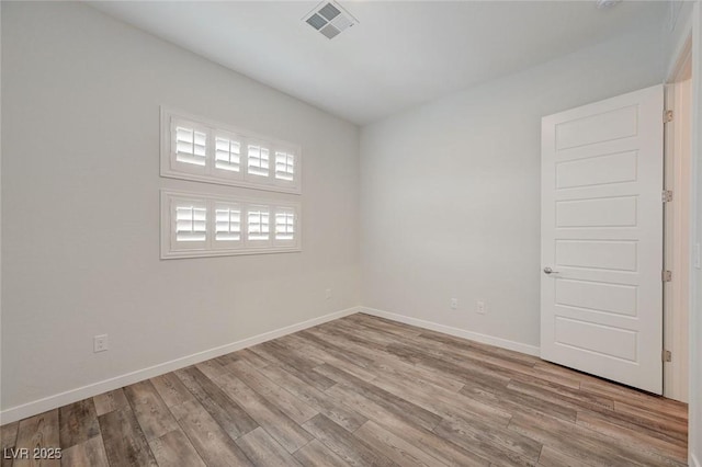 12436 Primrose Grove Ln, Las Vegas, NV 89138 - empty room with wood finished floors