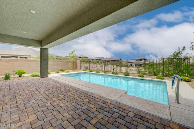 12436 Primrose Grove Ln, Las Vegas, NV 89138 - view of swimming pool featuring a fenced backyard and a patio