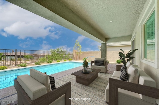 12436 Primrose Grove Ln, Las Vegas, NV 89138 - view of pool with an outdoor living space, a fenced backyard, and a patio area