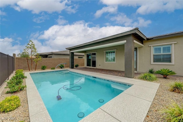 12436 Primrose Grove Ln, Las Vegas, NV 89138 - view of swimming pool with a fenced backyard and a patio area
