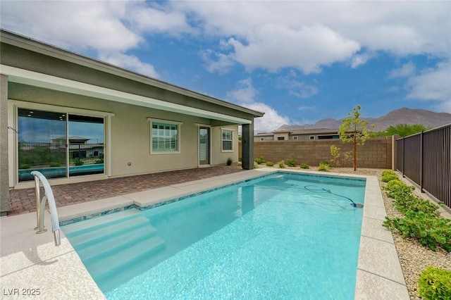 12436 Primrose Grove Ln, Las Vegas, NV 89138 - view of pool featuring a fenced backyard, a patio, and a mountain view