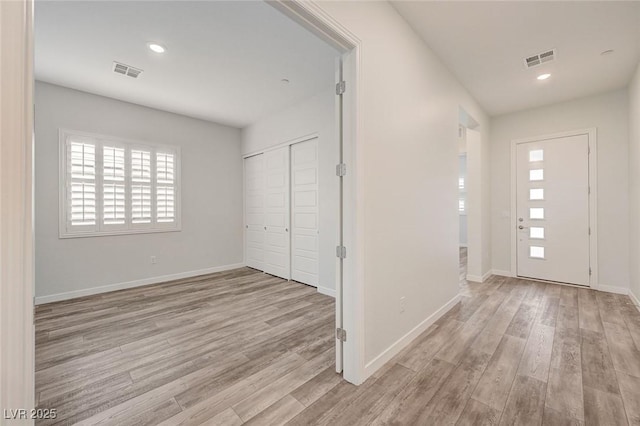 12436 Primrose Grove Ln, Las Vegas, NV 89138 - foyer entrance with light wood-style flooring, healthy amount of natural light, and recessed lighting