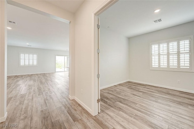 12436 Primrose Grove Ln, Las Vegas, NV 89138 - corridor with light wood finished floors and recessed lighting