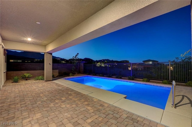 12436 Primrose Grove Ln, Las Vegas, NV 89138 - view of swimming pool with a fenced backyard and a patio