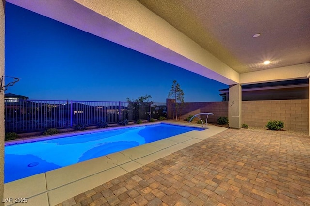12436 Primrose Grove Ln, Las Vegas, NV 89138 - view of swimming pool featuring a fenced backyard and a patio area