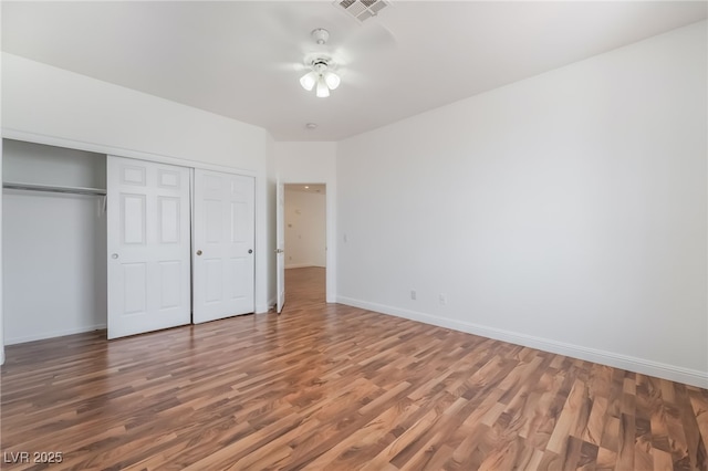 1312 Autumn Wind Way, Henderson, NV 89052 - unfurnished bedroom featuring wood finished floors and a closet