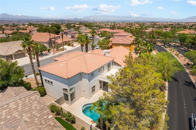 1312 Autumn Wind Way, Henderson, NV 89052 - aerial perspective of suburban area with a mountainous background and a pool