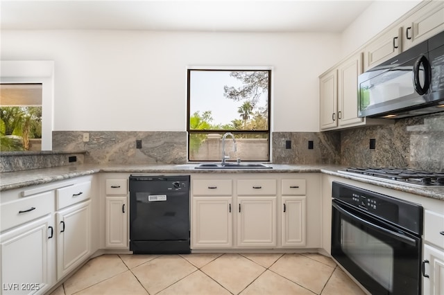 1312 Autumn Wind Way, Henderson, NV 89052 - kitchen featuring black appliances, light tile patterned floors, and decorative backsplash