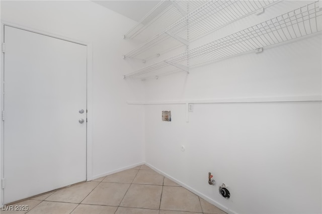 1312 Autumn Wind Way, Henderson, NV 89052 - laundry area featuring gas dryer hookup, light tile patterned floors, and hookup for a washing machine