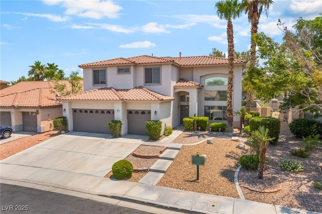 1312 Autumn Wind Way, Henderson, NV 89052 - mediterranean / spanish-style house featuring stucco siding, a tiled roof, and driveway