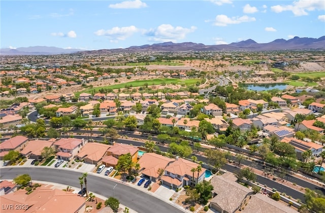 1312 Autumn Wind Way, Henderson, NV 89052 - aerial perspective of suburban area with a water and mountain view and a local golf course