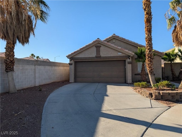 9182 Jewel Crystal Ct, Las Vegas, NV 89129 - ranch-style home with driveway, a garage, and stucco siding