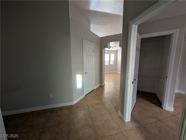 9182 Jewel Crystal Ct, Las Vegas, NV 89129 - hall with light tile patterned flooring and baseboards