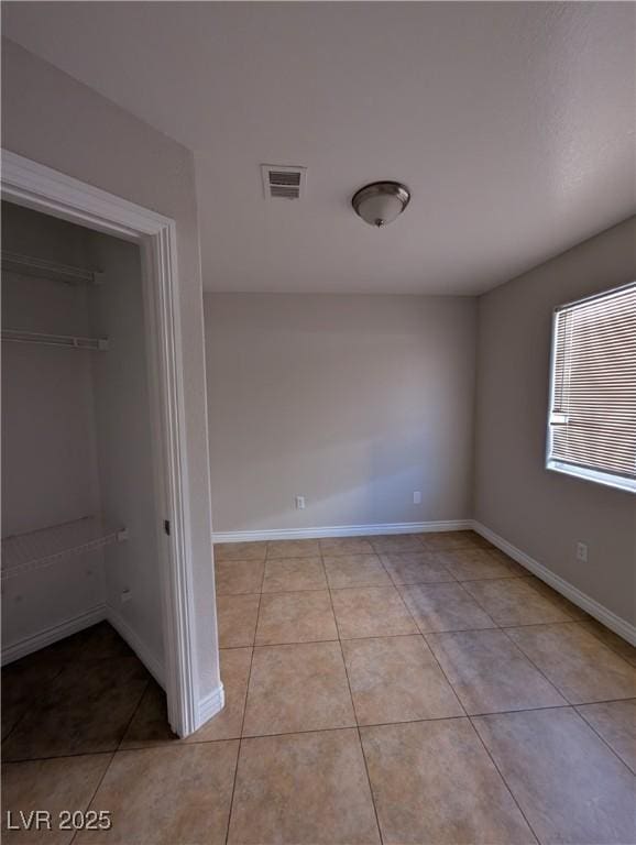 9182 Jewel Crystal Ct, Las Vegas, NV 89129 - empty room with tile patterned flooring and baseboards