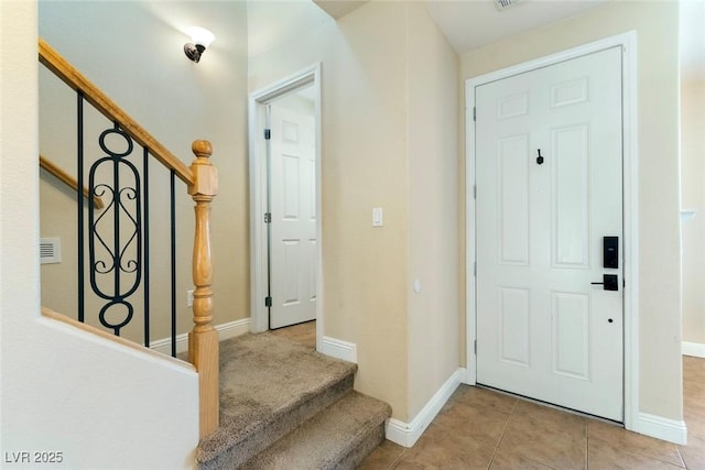 9305 Ironsend St, Las Vegas, NV 89143 - entrance foyer with stairway and light tile patterned flooring
