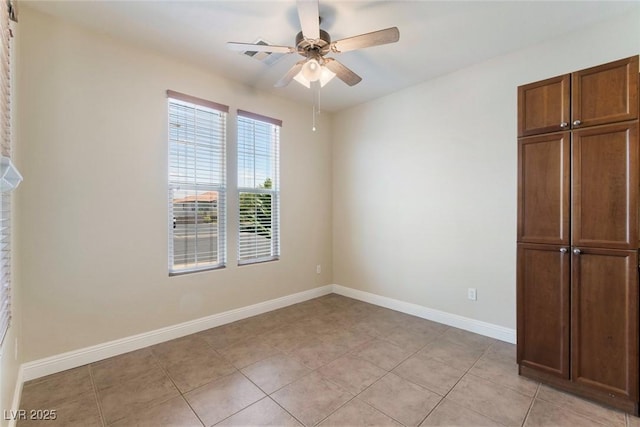 9305 Ironsend St, Las Vegas, NV 89143 - unfurnished bedroom featuring light tile patterned floors and ceiling fan