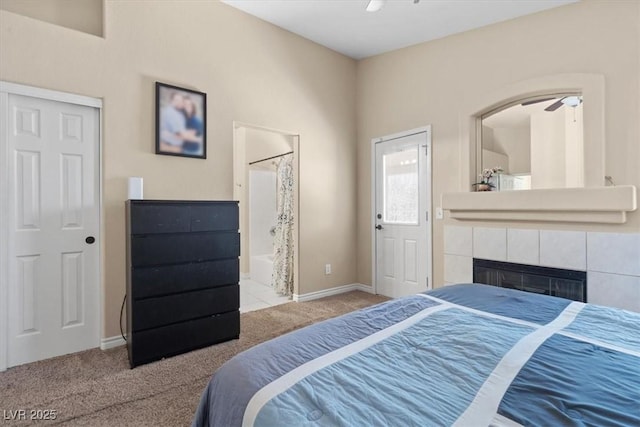 4928 Corsica Island St, North Las Vegas, NV 89031 - carpeted bedroom with ensuite bath and a tile fireplace