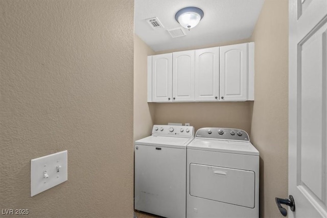 4928 Corsica Island St, North Las Vegas, NV 89031 - washroom with washing machine and dryer and cabinet space
