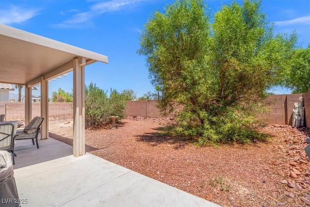4928 Corsica Island St, North Las Vegas, NV 89031 - fenced backyard with a patio