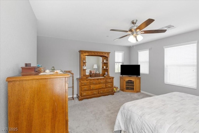 3310 Palindrome Ave, Henderson, NV 89044 - bedroom featuring light carpet and ceiling fan