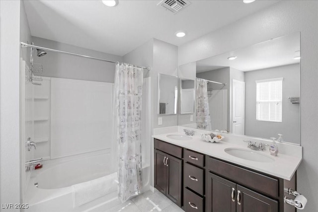 3310 Palindrome Ave, Henderson, NV 89044 - full bathroom featuring shower / bath combo with shower curtain, double vanity, and tile patterned flooring
