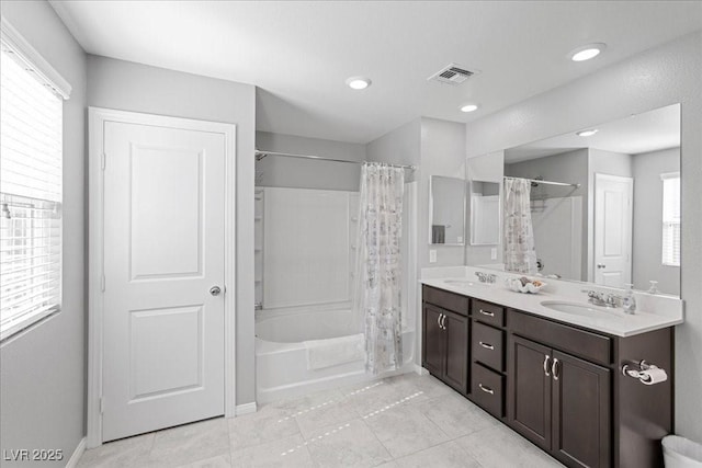 3310 Palindrome Ave, Henderson, NV 89044 - full bathroom with shower / bath combo, double vanity, tile patterned flooring, and recessed lighting