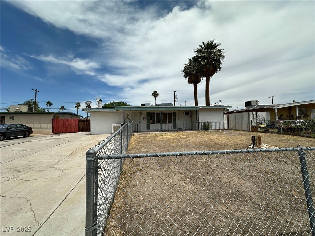 1412 Flower Ave, North Las Vegas, NV 89030 - view of front facade featuring driveway