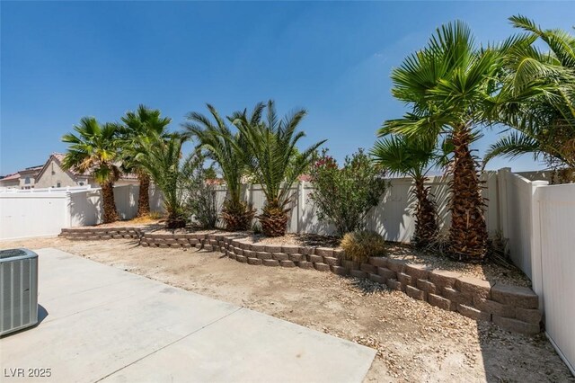 352 River Glider Ave, North Las Vegas, NV 89084 - fenced backyard with a patio area