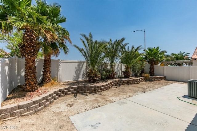 352 River Glider Ave, North Las Vegas, NV 89084 - fenced backyard with a patio area