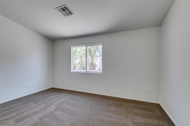 352 River Glider Ave, North Las Vegas, NV 89084 - spare room with dark colored carpet