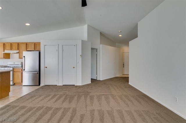 352 River Glider Ave, North Las Vegas, NV 89084 - unfurnished living room with lofted ceiling, light colored carpet, and recessed lighting