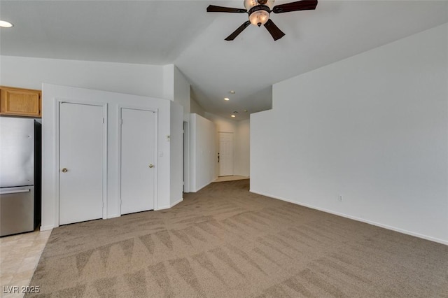 352 River Glider Ave, North Las Vegas, NV 89084 - unfurnished living room with ceiling fan, light carpet, recessed lighting, and lofted ceiling