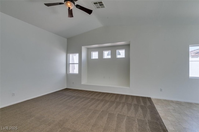 352 River Glider Ave, North Las Vegas, NV 89084 - unfurnished room with vaulted ceiling, a ceiling fan, and carpet floors
