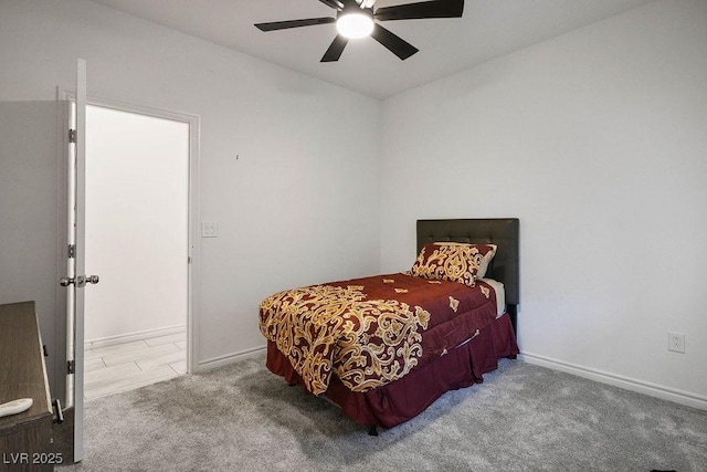 9740 Redwood Cascade St, Las Vegas, NV 89143 - carpeted bedroom featuring a ceiling fan and baseboards